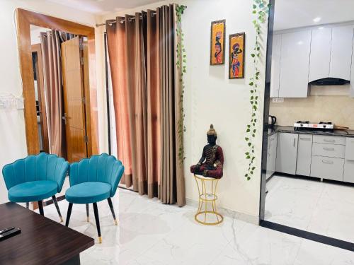 Køkken eller tekøkken på Ganga River cozy stay by The Nirvanaa blues