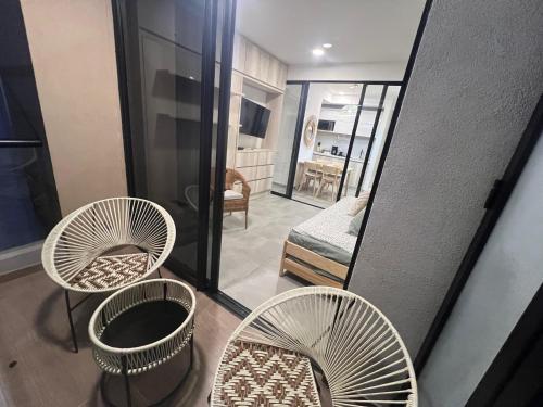 Un ou plusieurs lits dans un hébergement de l'établissement Samaia Loft