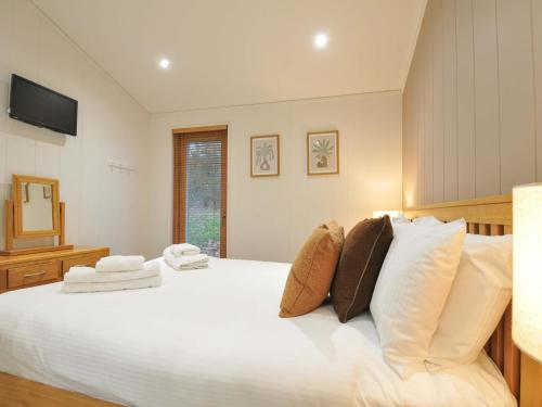 Кровать или кровати в номере 6 Hedgerows