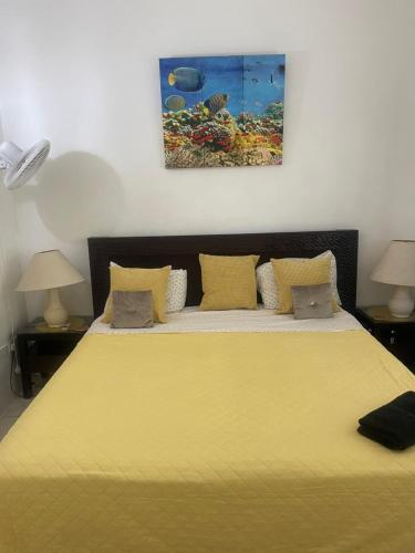 Postel nebo postele na pokoji v ubytování Tropical Harbour View