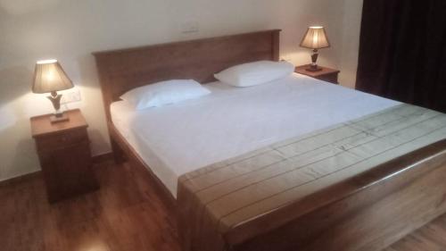 Postel nebo postele na pokoji v ubytování Elephant Path by Alpine Resorts