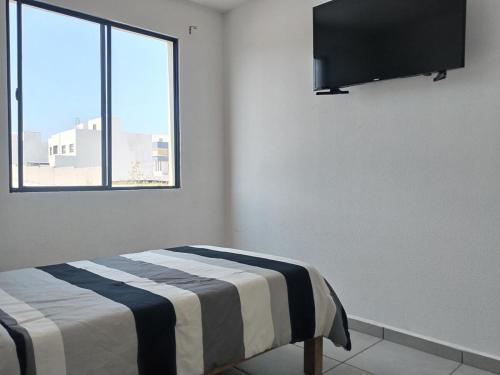 Imagen de la galería de House A in a residential condominium with a pool, en Miranda