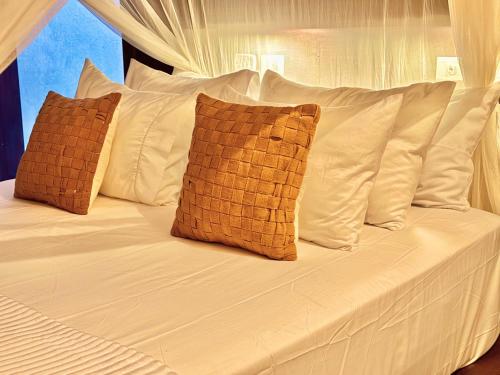 Ένα ή περισσότερα κρεβάτια σε δωμάτιο στο Kokar Casa Hotel - Santo André