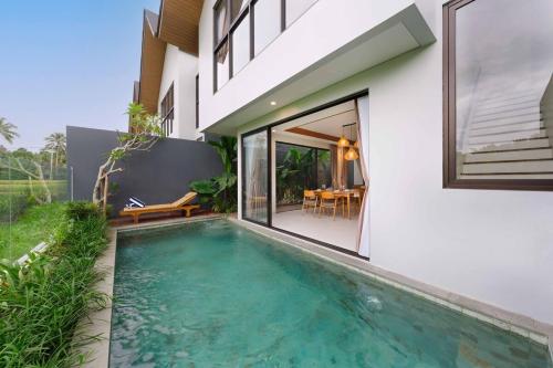 Φωτογραφία από το άλμπουμ του Private 2BR Oasis, Pool & Ubud Rice Field Edge σε Tegalalang