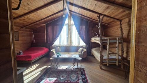 En eller flere senge i et værelse på Mountain Garden Cottage