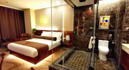 Un baño de James Joyce Coffetel Golmud Huaxing Plaza Branch