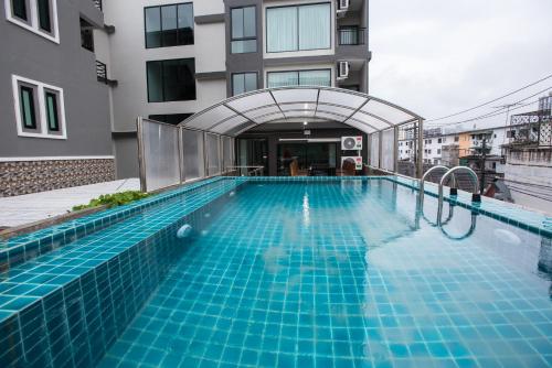 Bazén v ubytování Triple B Boutique Residence nebo v jeho okolí