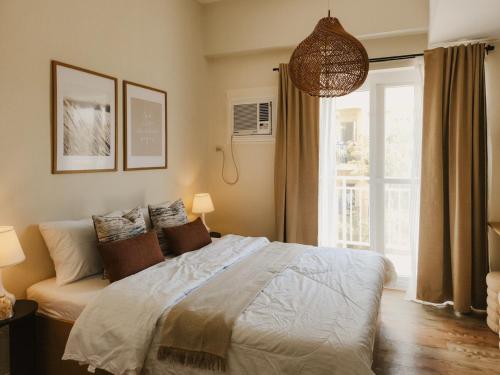 Postel nebo postele na pokoji v ubytování The Traveler's Haven at Bon's