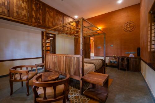 Posezení v ubytování Paithrukam house luxurious earthy homestay