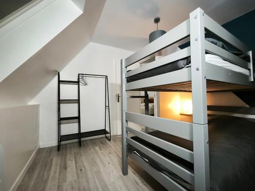 En eller flere senge i et værelse på le cosy proche du port