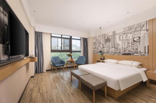 Кровать или кровати в номере City Comfort Inn Suzhou Wujiang Development Zone Yundong