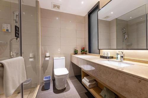 Ванная комната в City Comfort Inn Suzhou Wujiang Development Zone Yundong