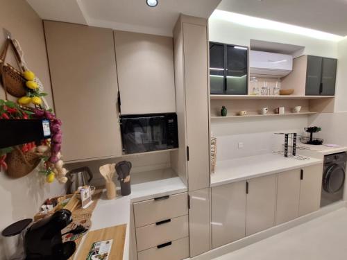 Kuchyň nebo kuchyňský kout v ubytování East Coast Vacation Homes