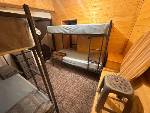a room with two bunk beds in a cabin at Tehran mets armenia in Yerevan