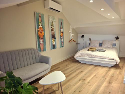 En eller flere senge i et værelse på La Parenthèse Rabelaisienne