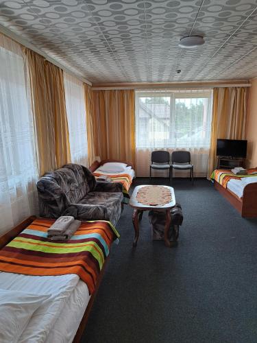 เตียงในห้องที่ Jeruzale Hotel