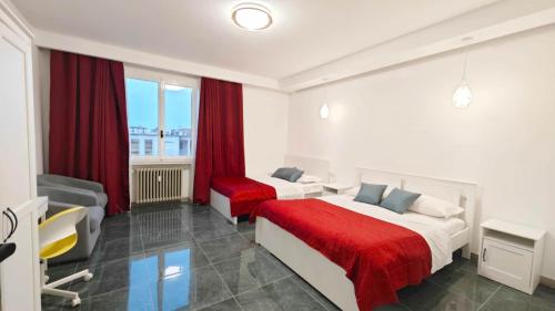 Ένα ή περισσότερα κρεβάτια σε δωμάτιο στο ANMAN HHBB tourism & business rooms