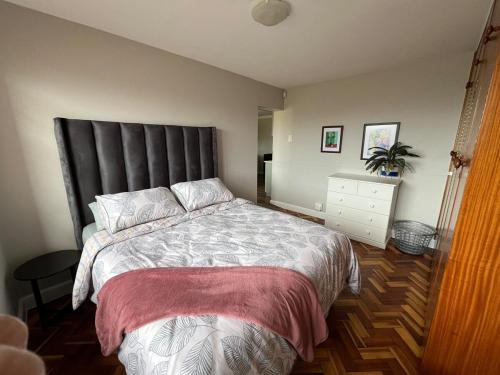 En eller flere senge i et værelse på Solas on Santos