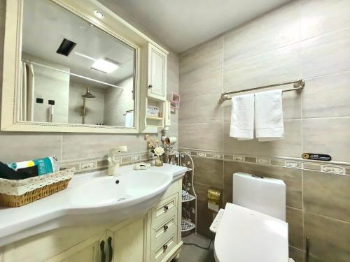 Koupelna v ubytování Meizuo Seaside Residence, near the seaside