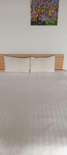 Ένα ή περισσότερα κρεβάτια σε δωμάτιο στο Eco Hotel Ly Thuong Kiet