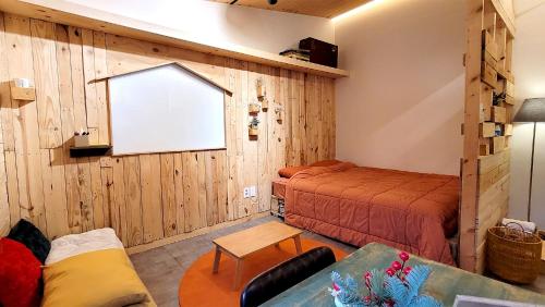 Ένα ή περισσότερα κρεβάτια σε δωμάτιο στο 허브스테이