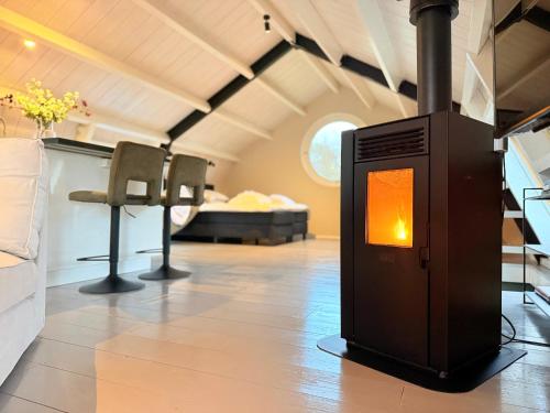 Ένα ή περισσότερα κρεβάτια σε δωμάτιο στο Natuurhuisje Heeren van Acquoy