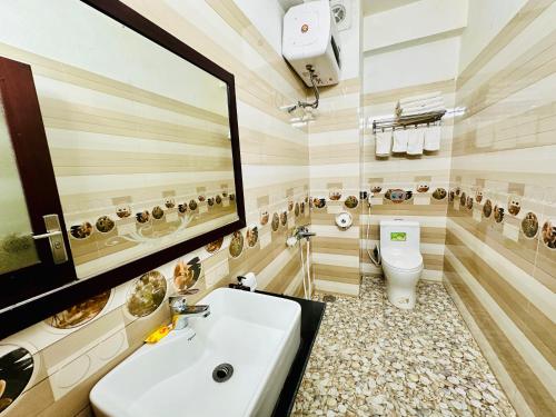 Koupelna v ubytování DH Sapa Hotel & Travel