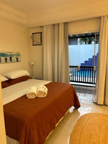 Кровать или кровати в номере Almas gêmeas suíte 6