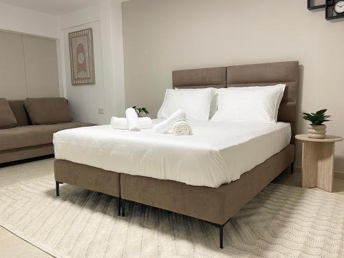 Ένα ή περισσότερα κρεβάτια σε δωμάτιο στο Ramon Palms