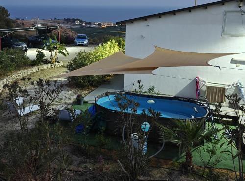 Swimmingpoolen hos eller tæt på Casa vacanze Abbacari