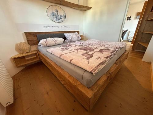 Postel nebo postele na pokoji v ubytování Ferienwohnung mit wundervollen Bergblick