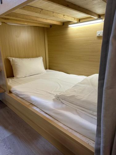 a bunk bed in a room with at Xingyi Hotel in Chiayi City