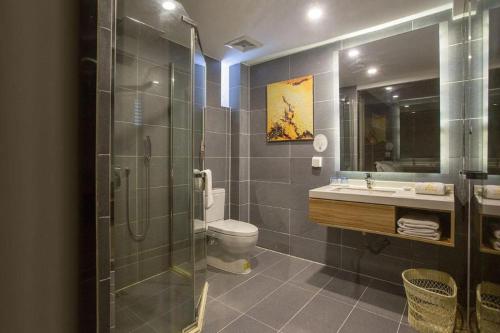 Ένα μπάνιο στο GreenTree Eastern Yancheng Administration Center Hotel