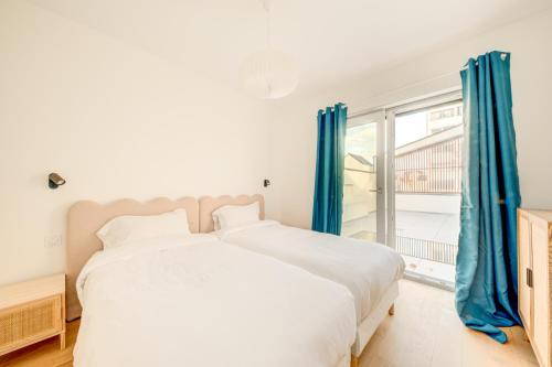 En eller flere senge i et værelse på Maison 5 pièces 10 min de Paris