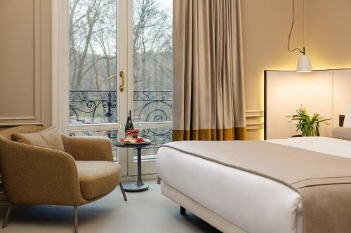 Postel nebo postele na pokoji v ubytování LUBICH Concept Hotel