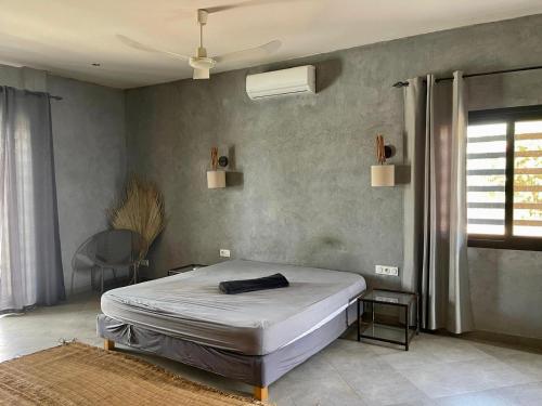 Llit o llits en una habitació de Villa Somone
