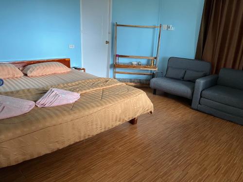 Postel nebo postele na pokoji v ubytování mor aud sriboya home