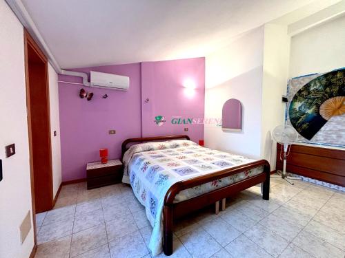 En eller flere senge i et værelse på Campanile