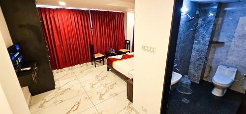 Koupelna v ubytování SAADHANA COMFORTS LODGE