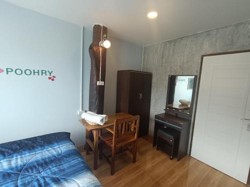 TV a/nebo společenská místnost v ubytování Poohry Seaview