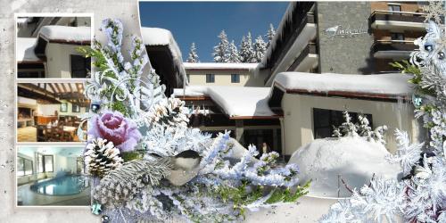 Un montón de adornos navideños frente a un edificio. en Finlandia Hotel, en Pamporovo