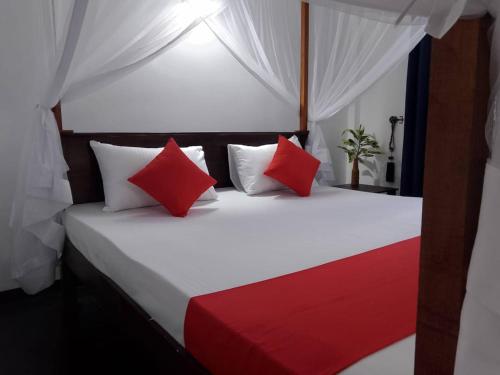 Postel nebo postele na pokoji v ubytování Ocevia - Tangalle