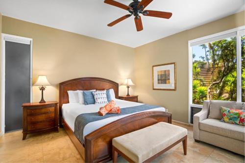 a bedroom with a bed with a teddy bear on it at Kapalua Bay Villas 2 Free Rental Cars KBM Resorts Large Master Suite 2 Units 3 Bedrooms ML-1528 in Honokahua