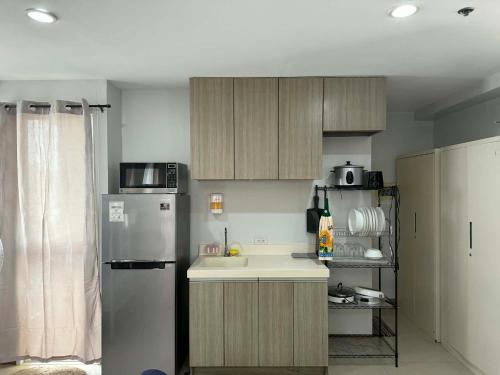 Η κουζίνα ή μικρή κουζίνα στο Penthouse A Near IT Park