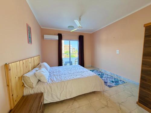 Giường trong phòng chung tại Sylvie guest house