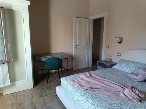 En eller flere senge i et værelse på House Delfina