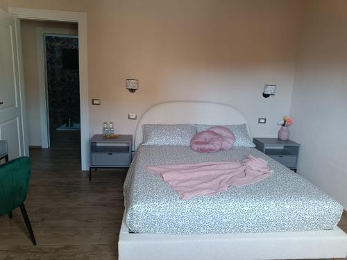 En eller flere senge i et værelse på House Delfina