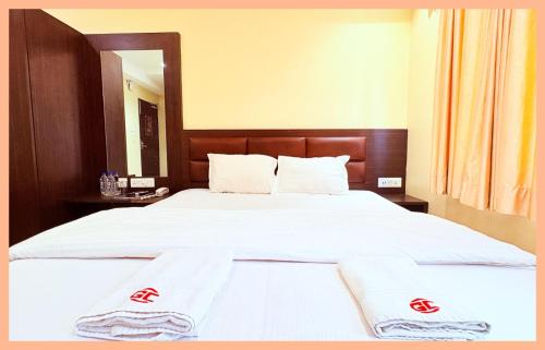 Giường trong phòng chung tại The Homestay Forever In Agra