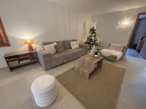 Χώρος καθιστικού στο Appartement La Vieille Maison Le joyau rénové