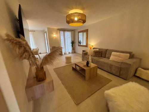 Χώρος καθιστικού στο Appartement La Vieille Maison Le joyau rénové